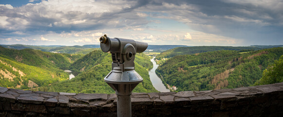 Panorama of a river loop in the Eifel with binoculars
