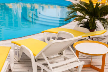 Obraz premium Swimming pool with stair at hotel close up
