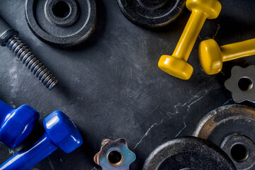 Sport and fitness background with dumbbells