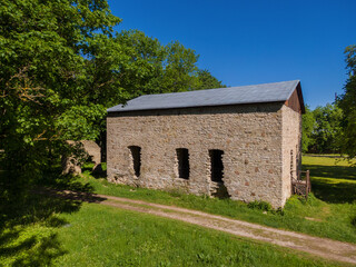Fototapeta premium Jarve village / Estonia - June 13 2020: Aerial view of Järve manor ruins (sometimes carrying a name Türpsal). About 15 century.