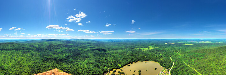 Panorama of the endless forest on bright sunny day. View from above © Art Event ET