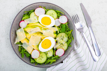Green salad with avocado and eggs