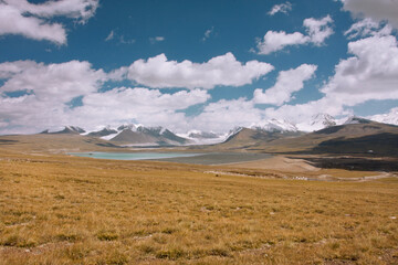 Artificial reservoir in the mountains of Central Asia at height of 4,000 meters