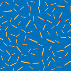 Vector illustration. Seamless pattern pencils on a blue background.