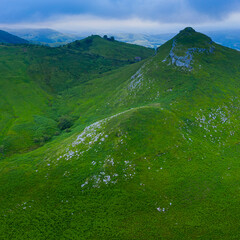 Aerial view from a drone from Alto del Caracol. Between the Miera Valley and the Pisueña Valley. In the background the Pisueña Valley. Valles Pasiegos, Cantabria, Spain, Europe