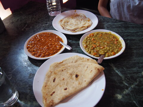 Curry, Chapati and Parotta, the local cuisine of South India, Alleppey (Alappuzha), Kerala, India