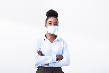 Masked woman - protection against influenza virus. African - American woman wearing mask for protect. Woman wear with protective face mask at home. Stop the virus and epidemic diseases.