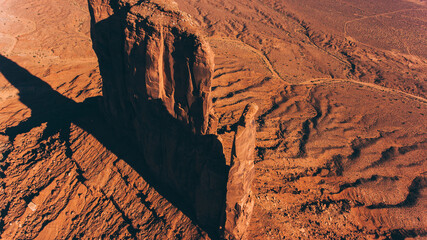 Bird's eye scenery view of beautiful Monument Valley famous landmark of southwest USA. Aerial view of brown cliffs in sandy dessert of Arizona