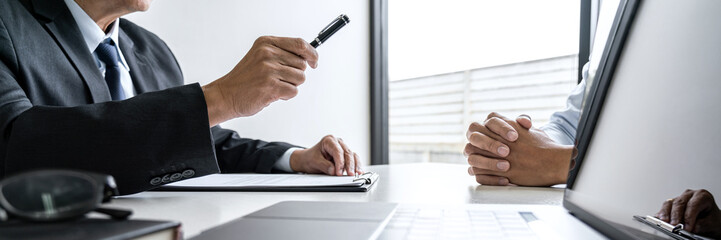 Senior selection committee asking questions to applicant about interview