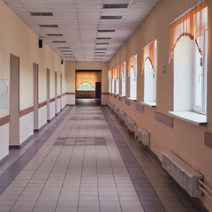 Obraz premium Empty school corridor during quarantine isolation. Closed school during the coronavirus pandemic