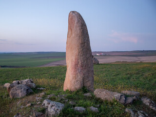 menhir in spain at the fall of the sun
