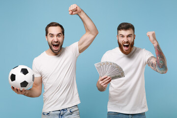 Screaming men guys friends in white t-shirt isolated on blue background. Sport leisure lifestyle...