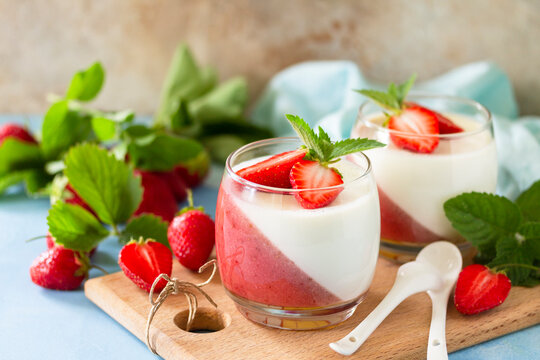 Panna Cotta with jelly strawberries, Italian dessert, home cooking.
