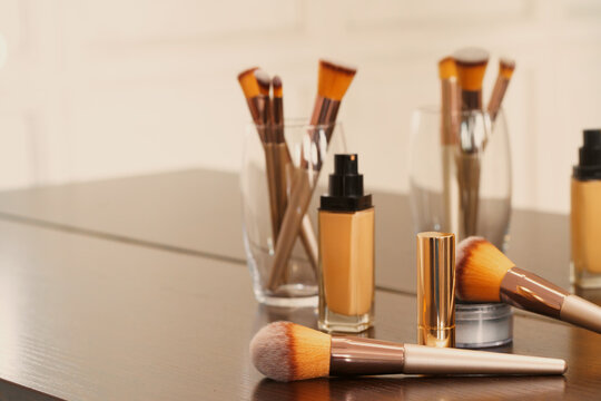 Decorative Cosmetics And Tools On Dressing Table In Makeup Room