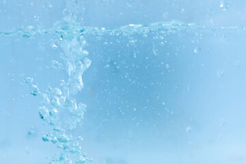 Water droplets moving in waves