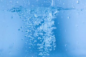Water droplets moving in waves