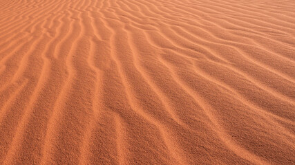 texture and background of a sand dune with traces of the wind in desert