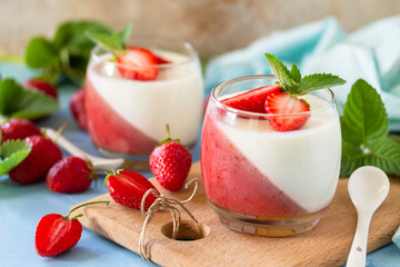 Panna Cotta with jelly strawberries, Italian dessert, home cooking.