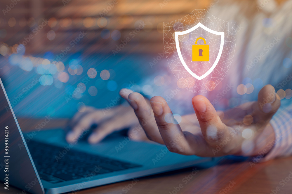 Poster person using a laptop computer with technology cybersecurity and privacy concept.