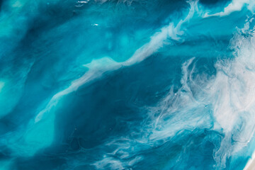 Fototapeta na wymiar abstract epoxy resin painting. Like see, sky. Blue vawes. colourful background