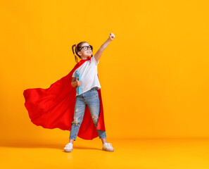 Little superhero studying at school.