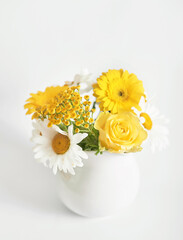 Bouquet of beautiful daisies on white background. Festive spring or summer card. Congratulations on mother's day. Women's Day. Happy Birthday! Cozy morning. Chamomile background.