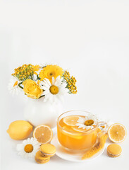 Spring and summer card. Daisies tea cup with lemon slice. Herbal tea with fresh flowers chamomile...