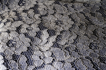 Fototapeta premium Blue lace texture. Lace background. Romantic fabric.