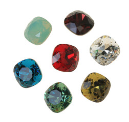 Colored crystals for jewelry on a white background. Isolated