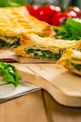 Spinach and Feta Cheese Strudel. Puff Pastry Filled with Spinach and Ricotta Cheese. Selective focus.