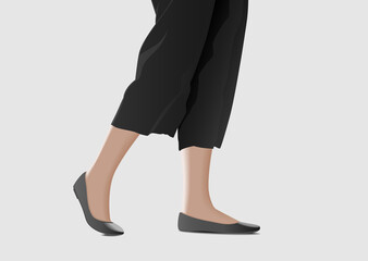 Legs of woman wearing black pants