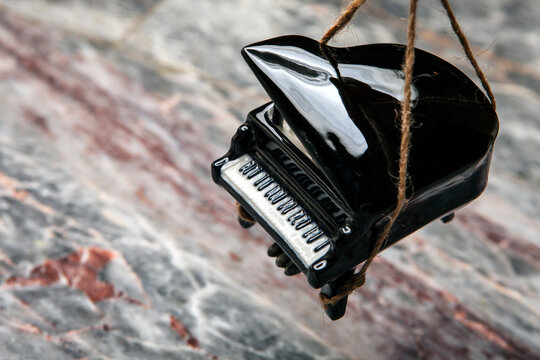 image of black piano rope