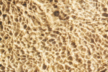 Natural sand and waterripples background