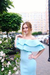 .Portrait of a young woman  in  beautiful dress, happy and smiling girl