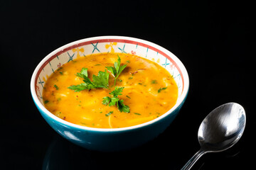 a bowl of soup, vegetables and noodles, hot food