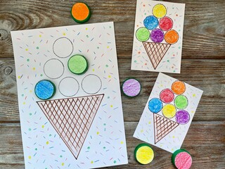Children's game is made by hand from secondary materials, for the attention of children.