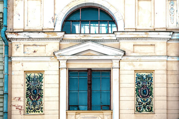 Fototapeta na wymiar Classic vintage building facade with windows.