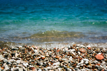 Pebble beach and warm sea