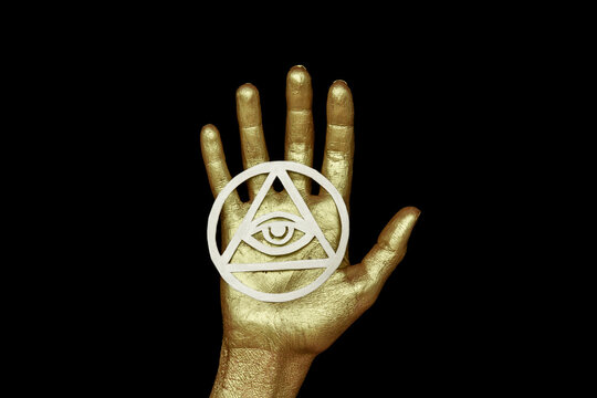 Open palm, hand with occult symbol Eye of Providence. 