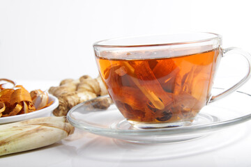 Picture of traditional herbal drink that contains ginger, clove, limegrass, cinnamons and secang (Caesalpinia sappan L) for immunity improvement