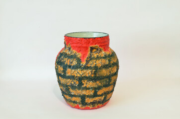 Beautiful vase with drawings, acrylic drawing of a brick on a round vase