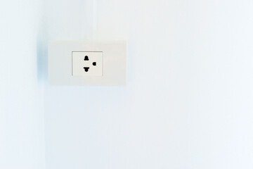 Outlet install on wall in new house with copy space