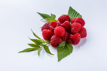 Juicy fresh natural raspberries on white acrylic background