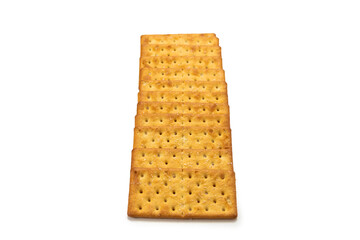 Cracker with salt isolated on white.