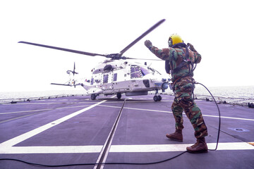 Helicopter being guided to land