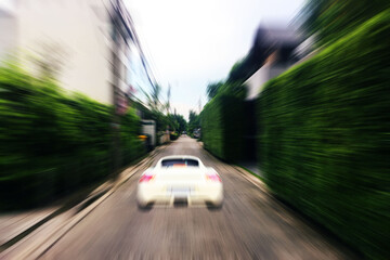 Obraz na płótnie Canvas sport car run speed background by blur