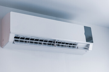 Air conditioner on wall background