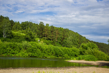 Beautiful nature, river, green forest and blue sky