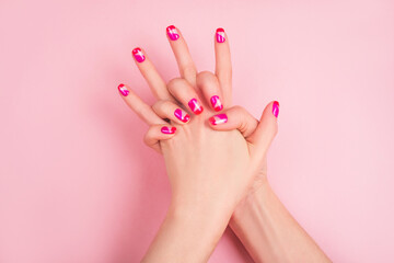 Trendy and bright manicure design in pink