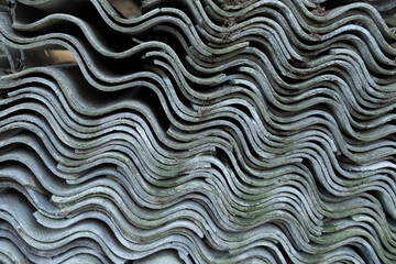 Asbestos cement roofing sheets stacked 
